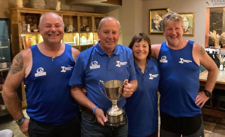 Delighted crew with their trophy